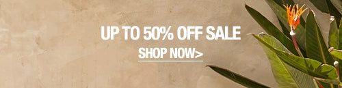 Sale banner with text 'Up to 50% Off Sale' and 'Shop Now' on a beige background with green leaves.
